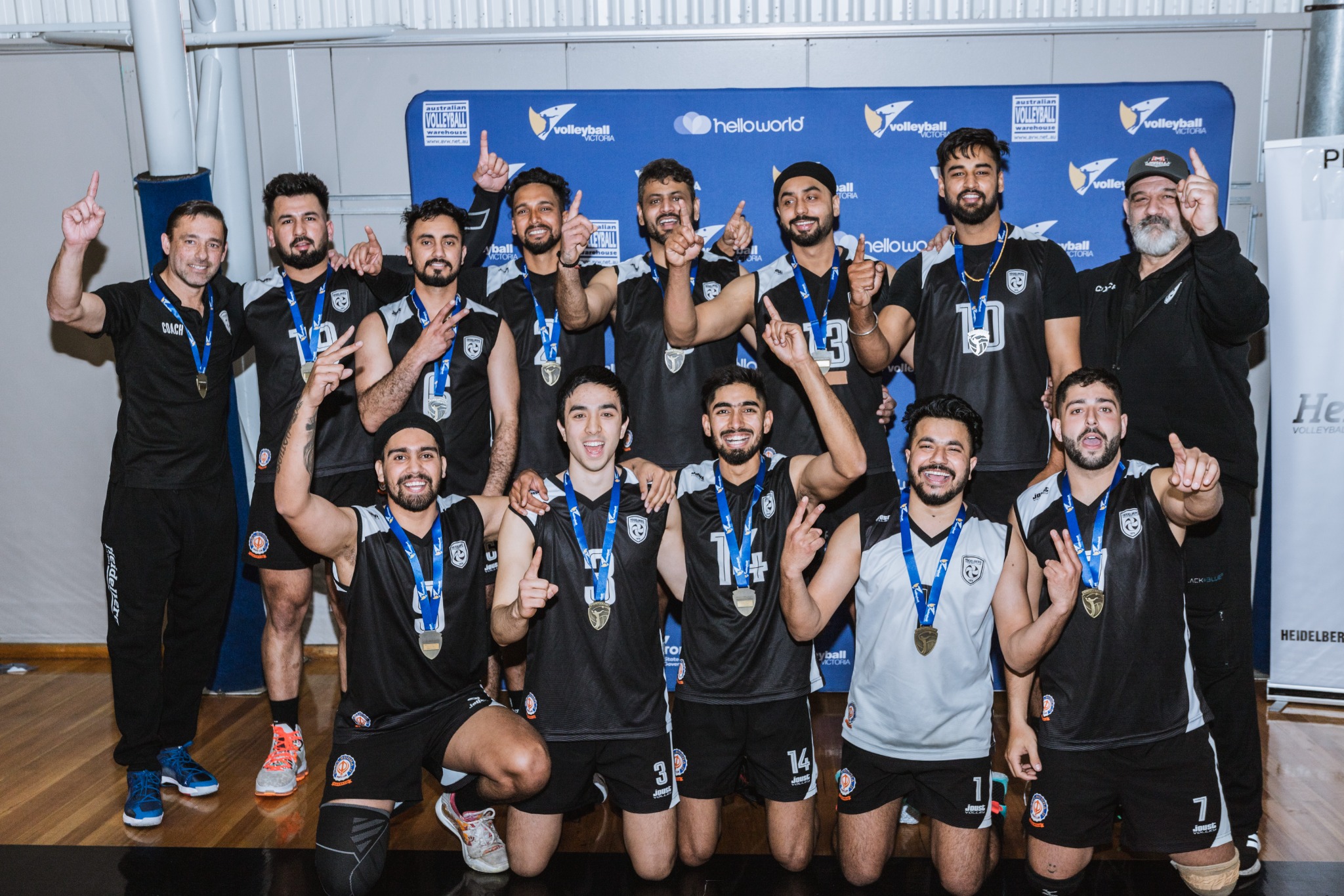 Heidelberg Premier 1 Men celebrating the 2023 State League championship