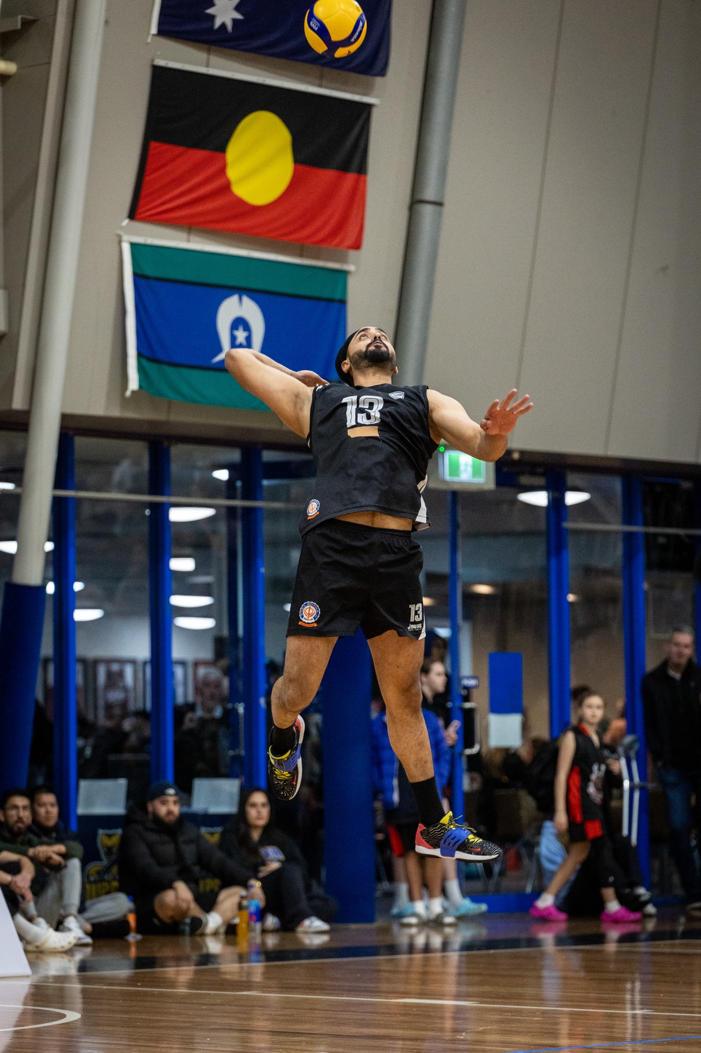 Kanwar Pal Singh airborne for a jump serve
