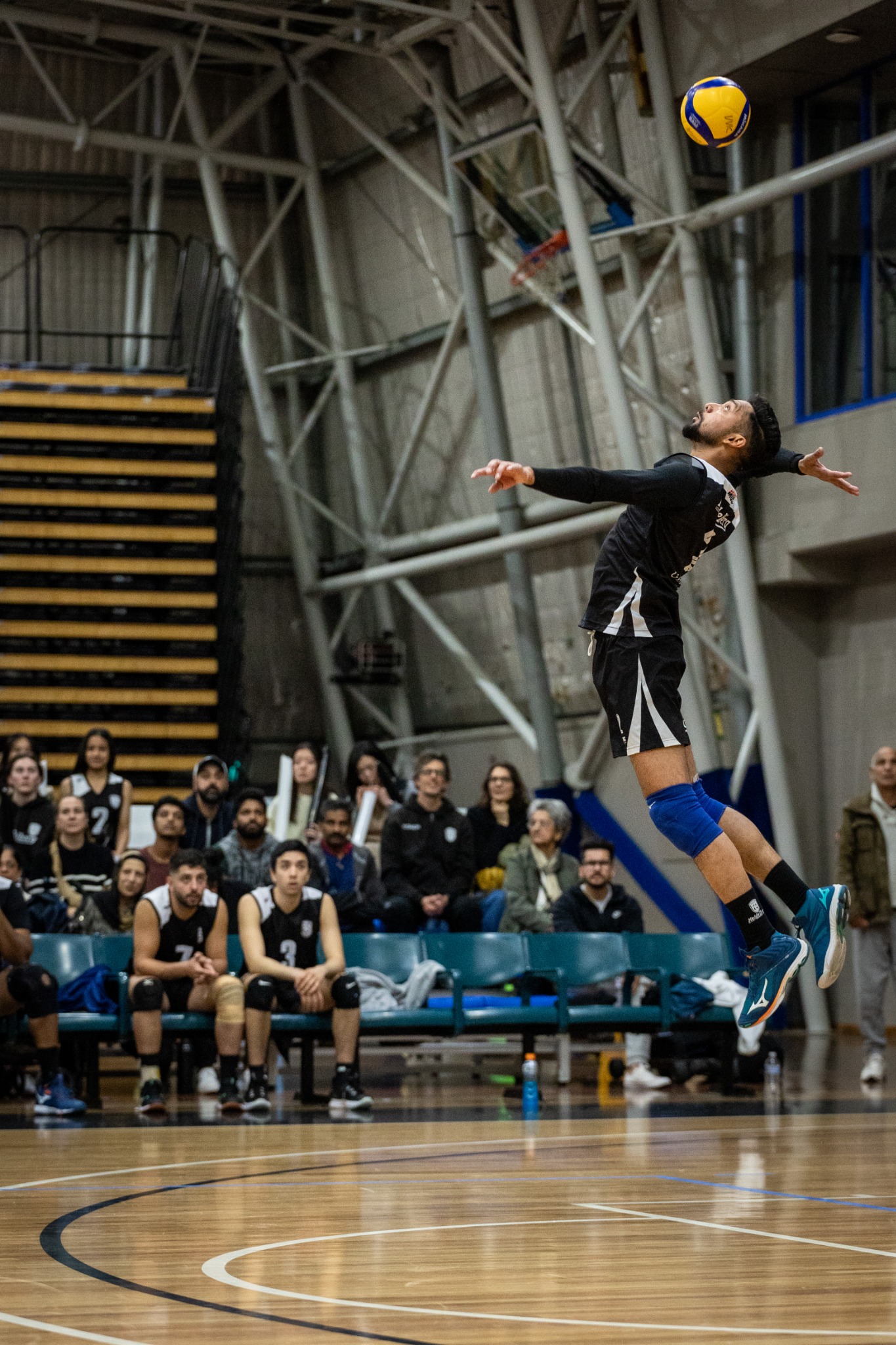 Pawandeep Singh airborne during a jump serve