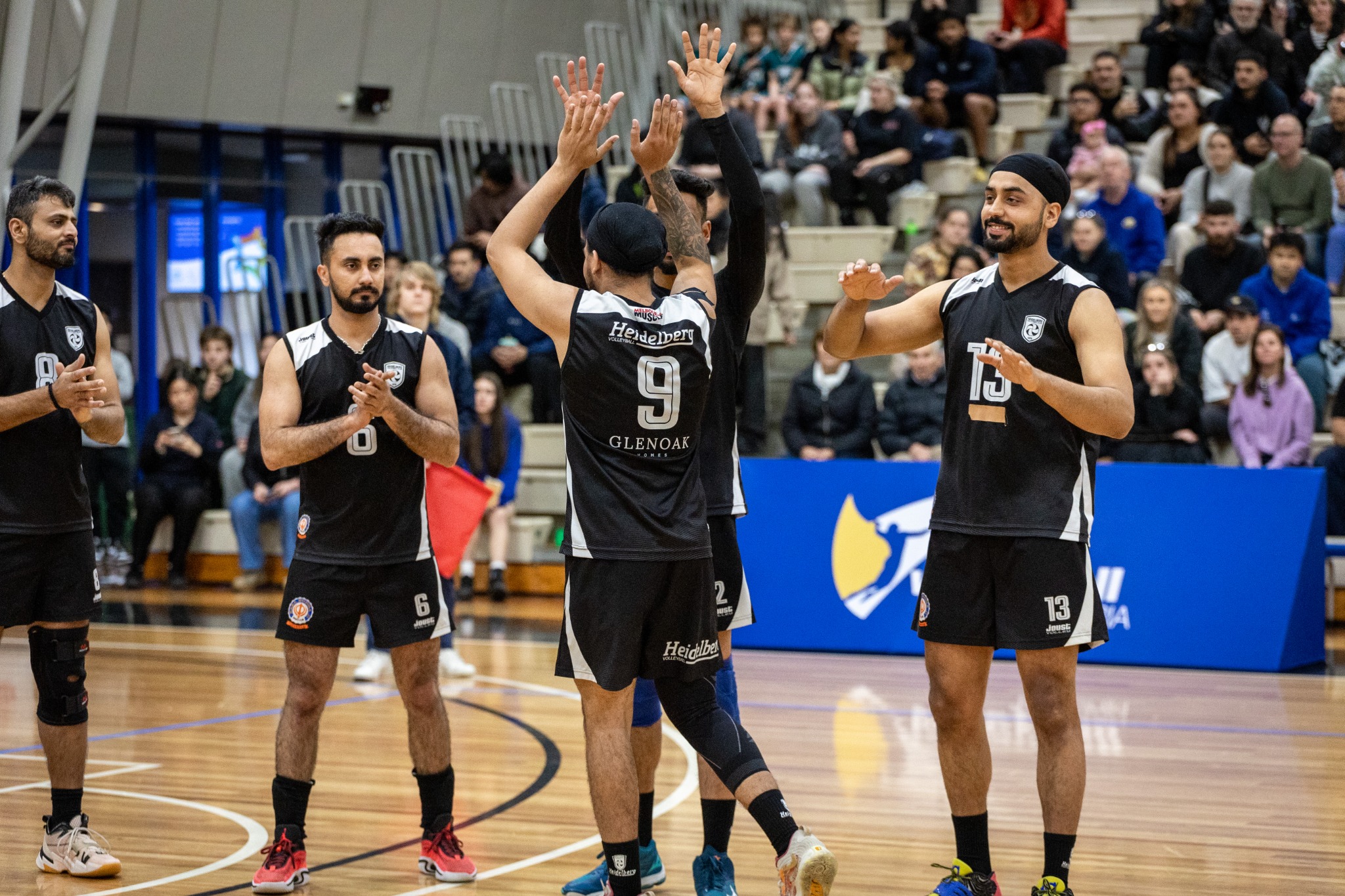 Heidelberg players celebrating a point in the 2023 season